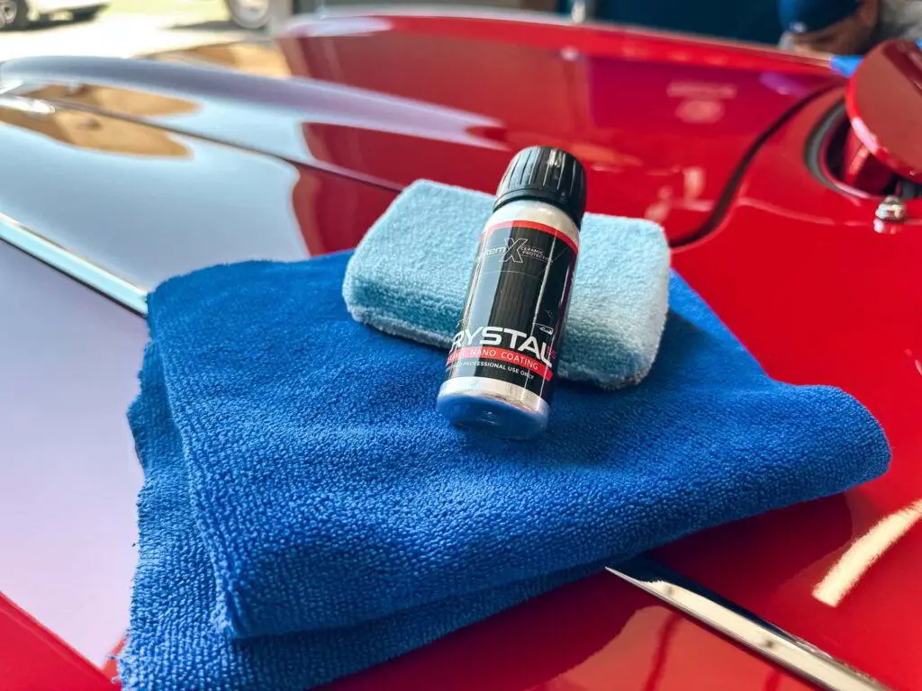 red car hood ceramic coating system x daniel's detailing mesa az